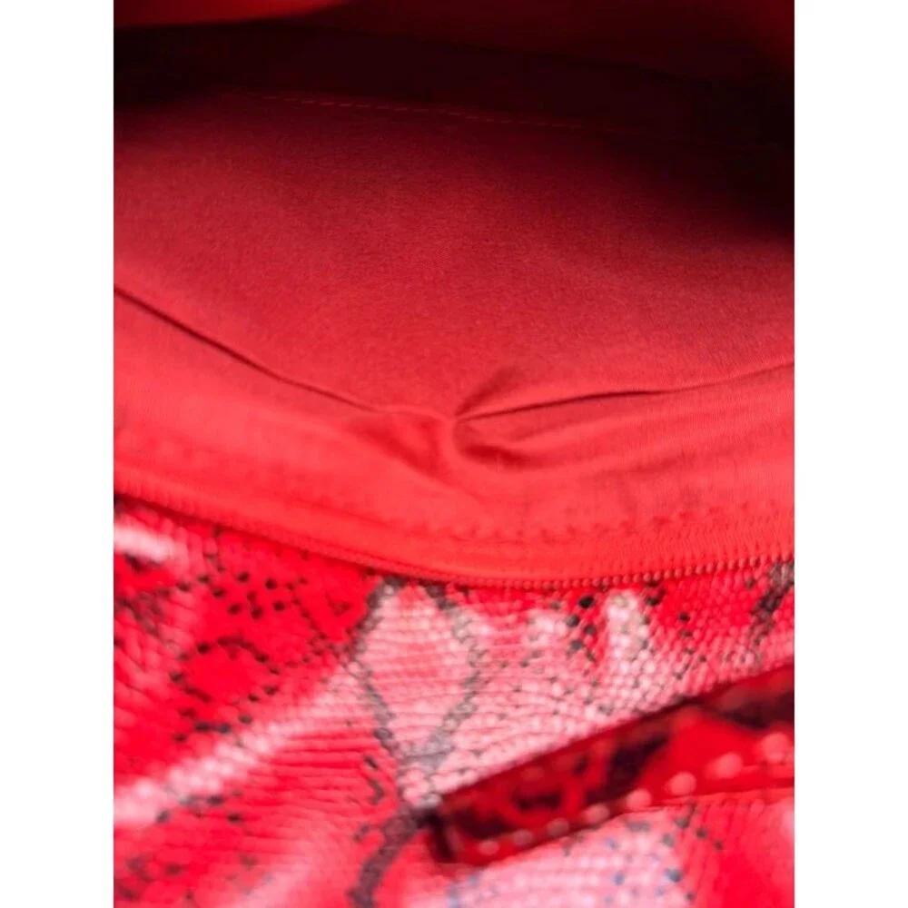 red and black faux-snakeskin envelope clutch